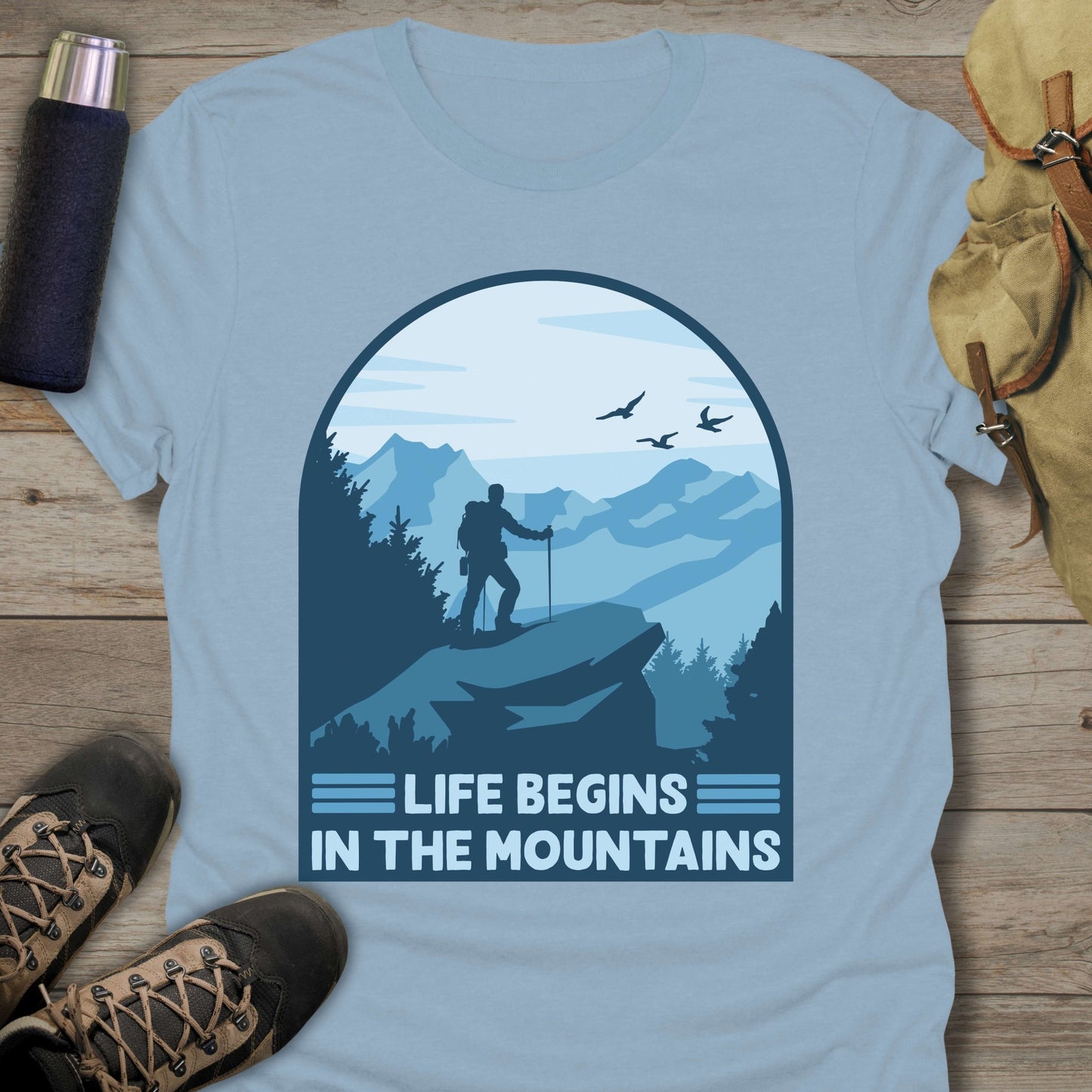 Funny hiking shirts and funny shirts for men. Life begins in the mountains in color light blue.