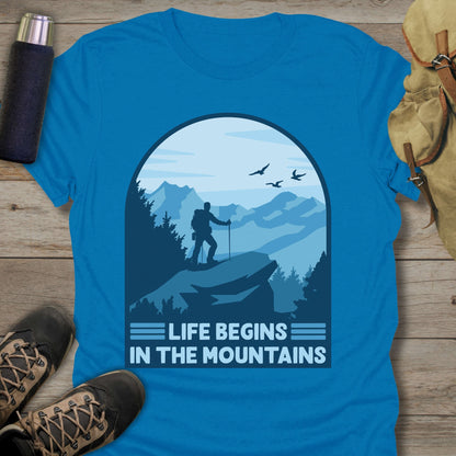 Funny hiking shirts and funny shirts for men. Life begins in the mountains in color sapphire.